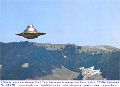 Old photograph of a disc-shaped object over hills